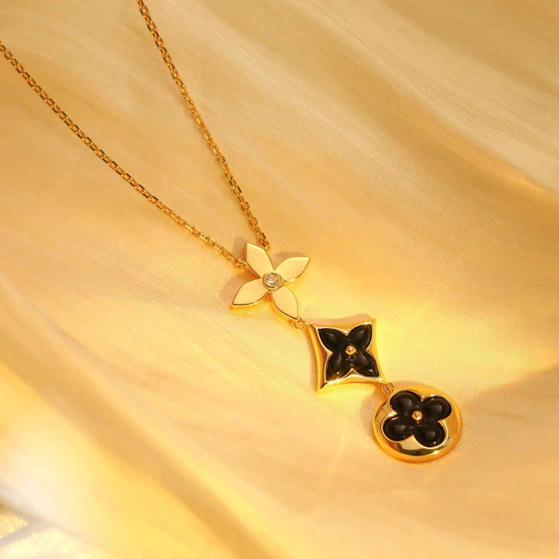 DIANA STAR AND SUN ONYX PINK GOLD NECKLACE
