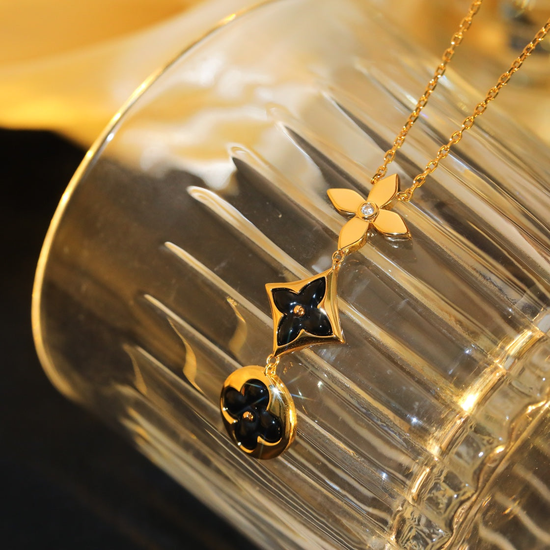 DIANA STAR AND SUN ONYX PINK GOLD NECKLACE