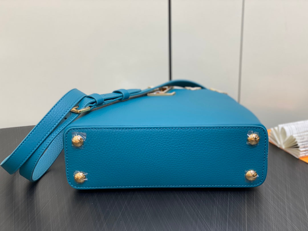 CAPUCINES BB 27 BLUE TAURILLON GOLD HARDWARE