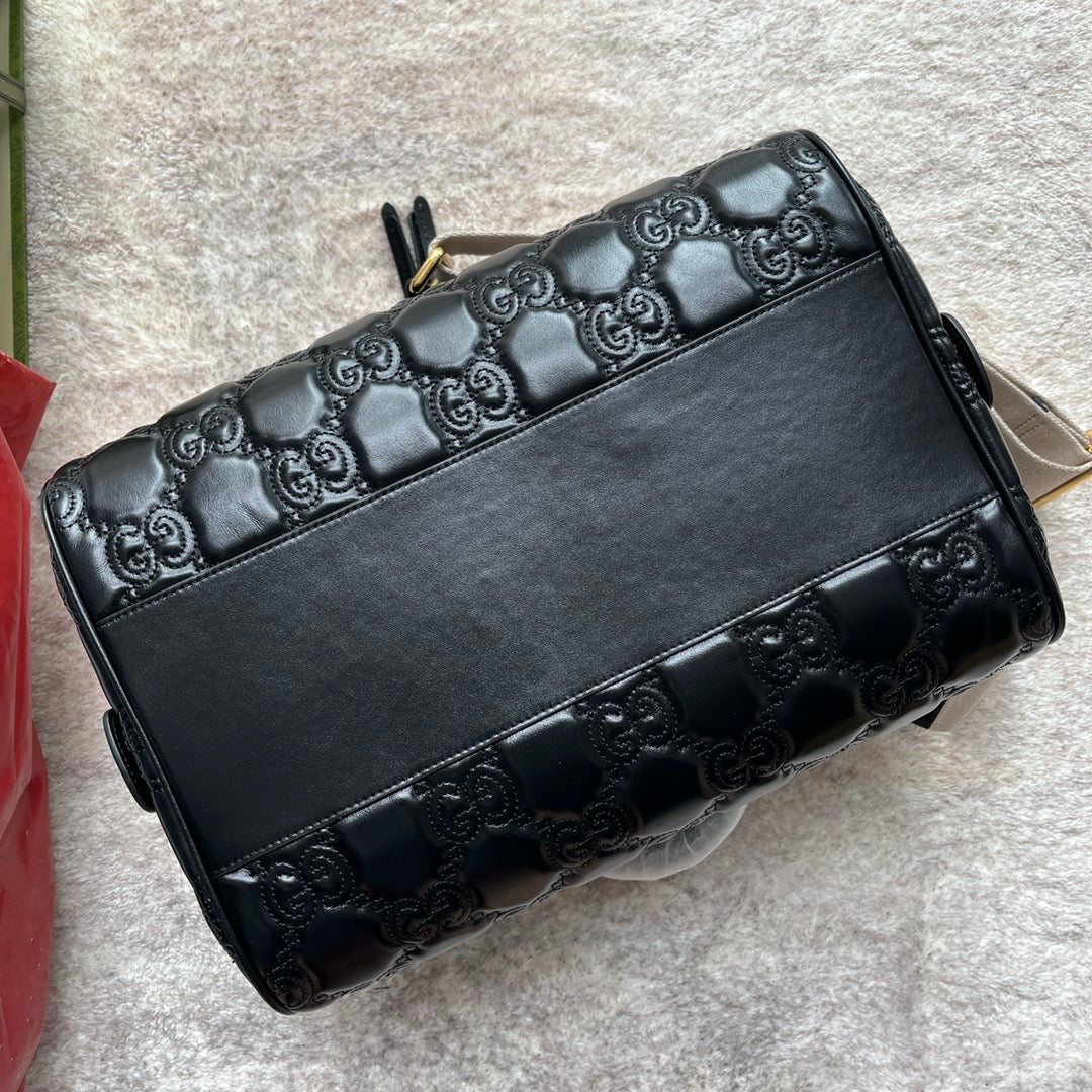 MATELASS¨¦ TOP HANDLE BAG 31 IN BLACK EMBOSSED CALFSKIN GOLD HARDWARE