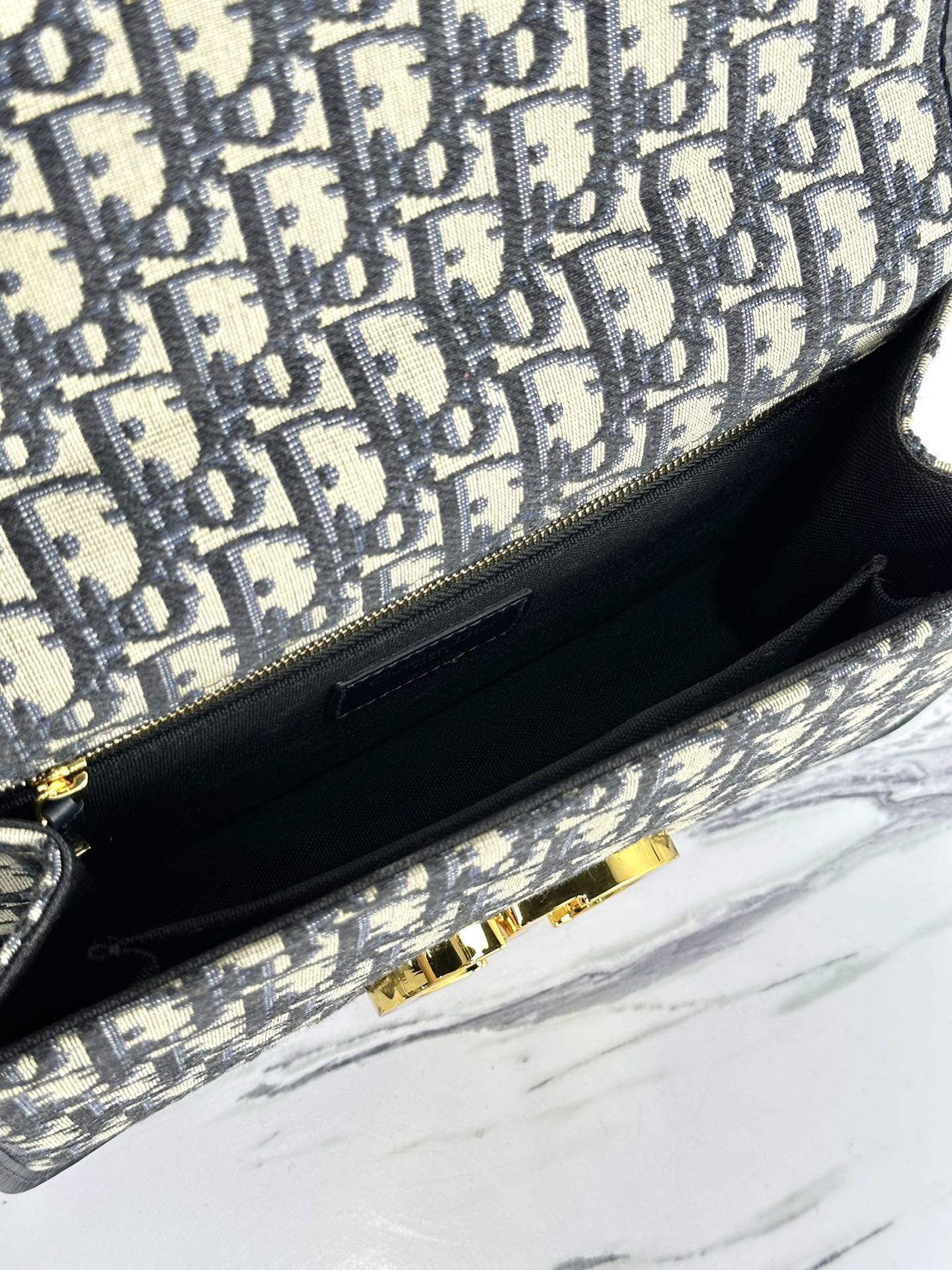 MONTAIGNE 25 BAG IN BLUE OBLIQUE JACQUARD