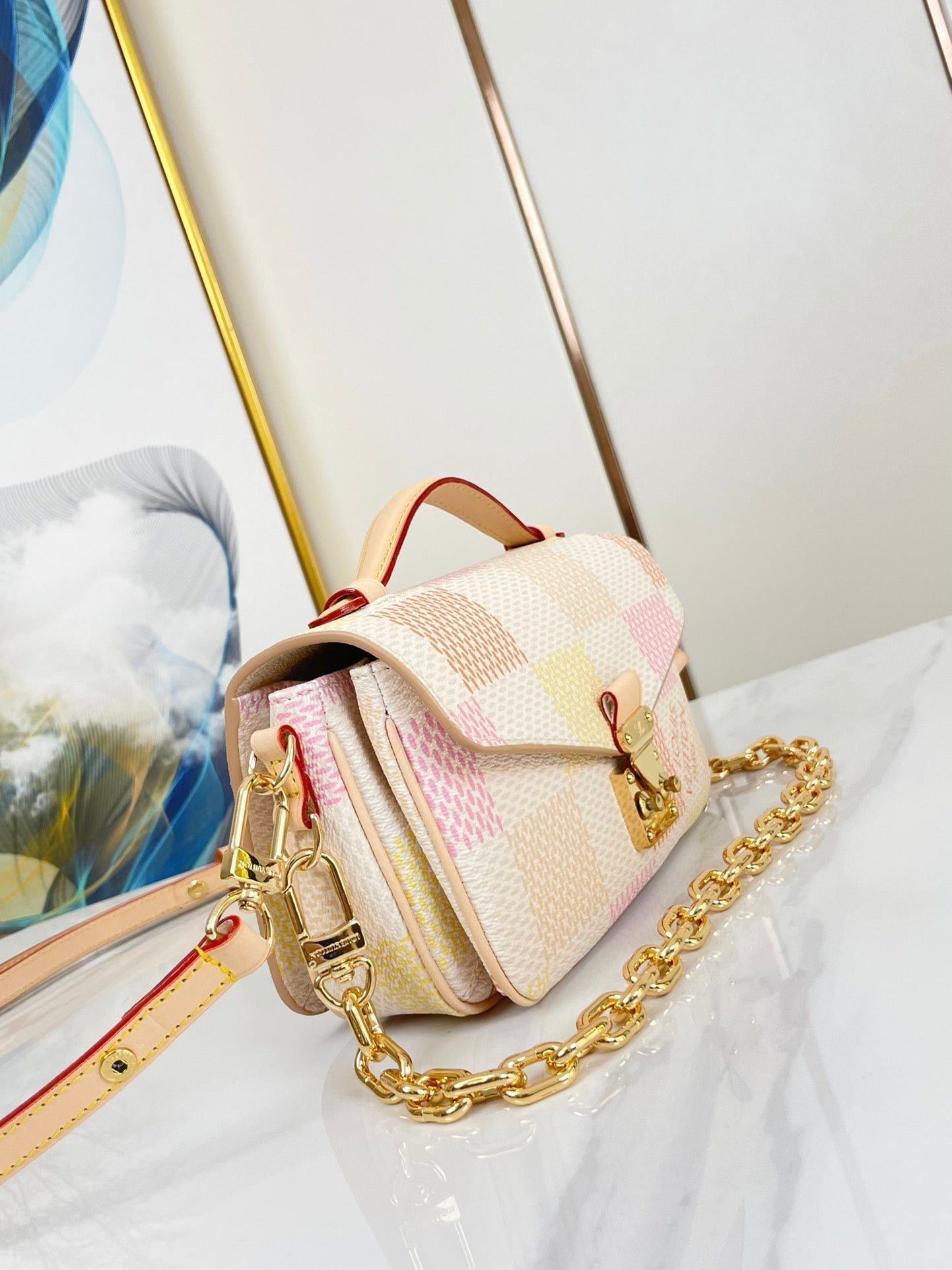 POCHETTE M¨¦TIS EAST WEST 21 IN PEACH DAMIER GIANT CANVAS GOLD HARDWARE