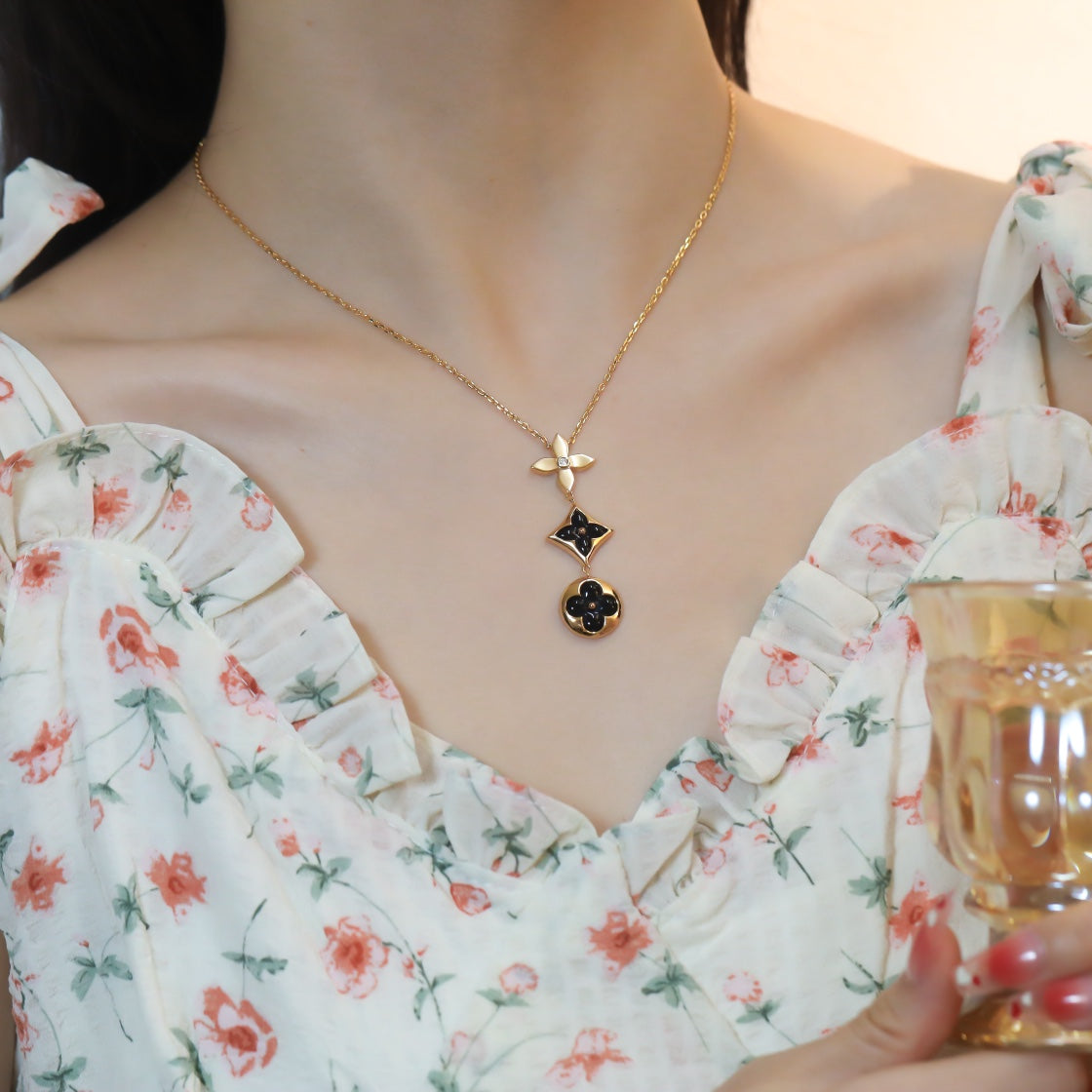 DIANA STAR AND SUN ONYX PINK GOLD NECKLACE