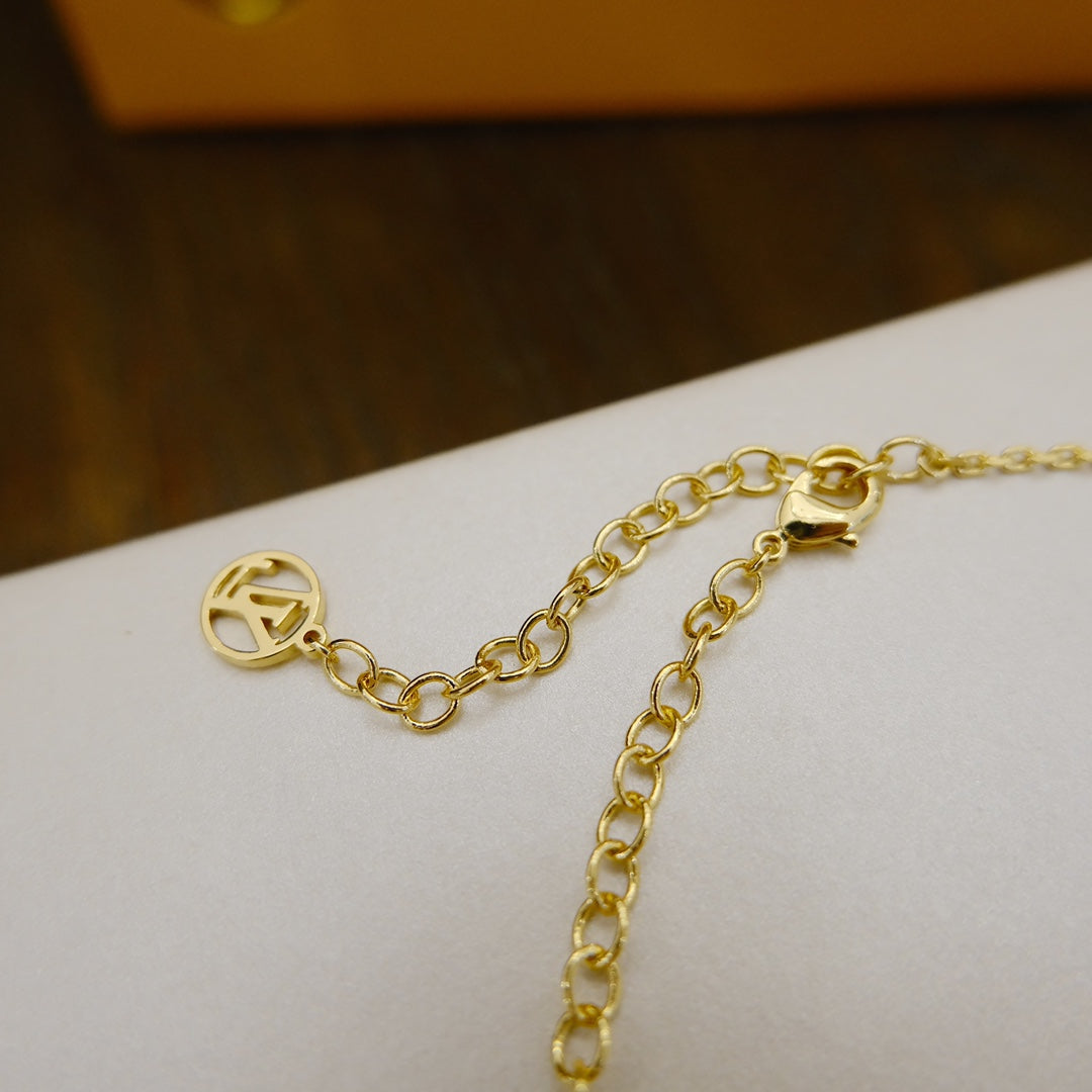 DIANA BLOOMING SUPPLE NECKLACE BRASS