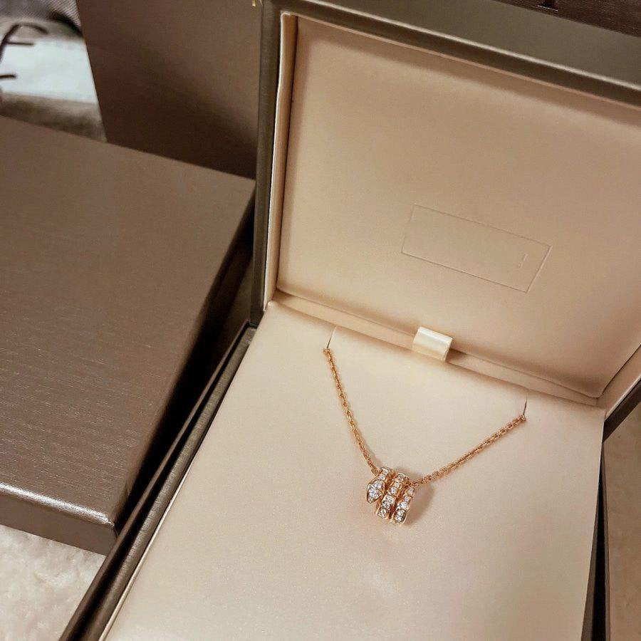 DIANA SERPENTI PINK GOLD NECKLACE DOUBLE RING DIAMOND