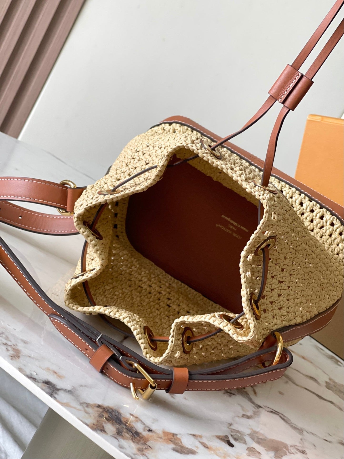 NO¨¦ PURSE 24 IN BEIGE CROCHETED RAFFIA AND BROWN CALFSKIN TRIM