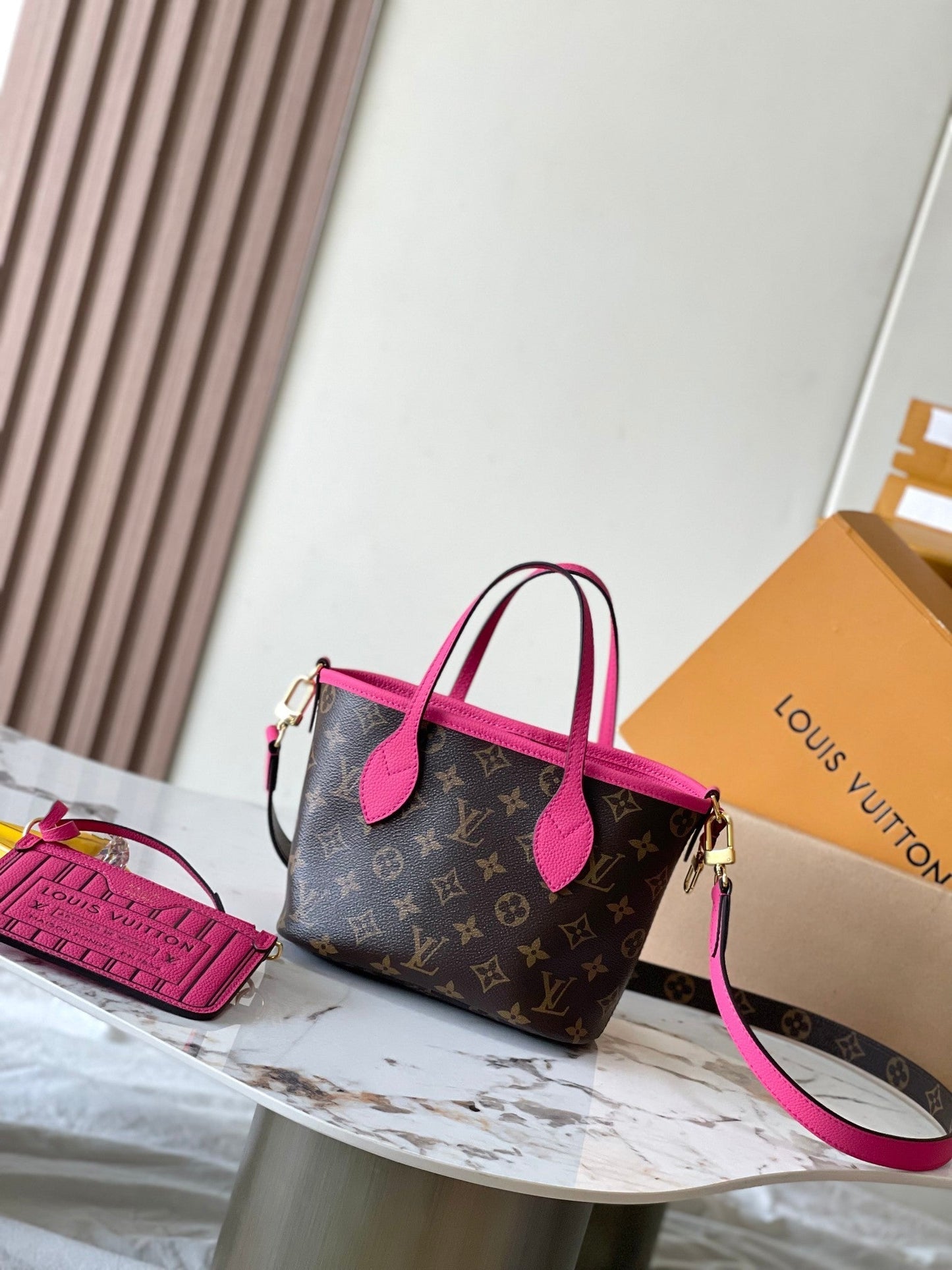 NEVERFULL BANDOULI¨¨RE INSIDE OUT BB 24 IN BROWN MONOGRAM CANVAS AND PINK CALFSKIN