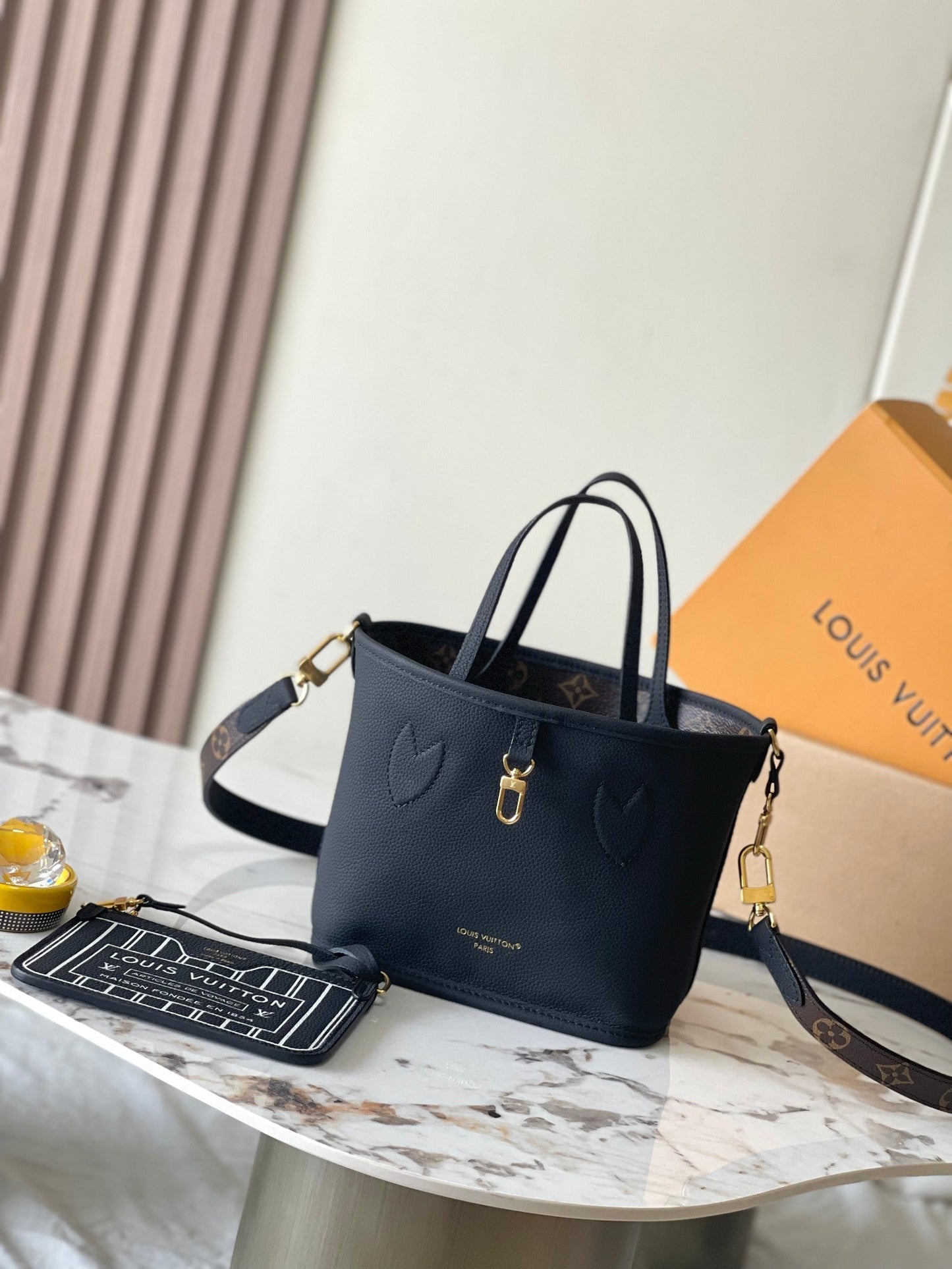 NEVERFULL BANDOULI¨¨RE INSIDE OUT BB 24 IN BROWN MONOGRAM CANVAS AND BLACK CALFSKIN