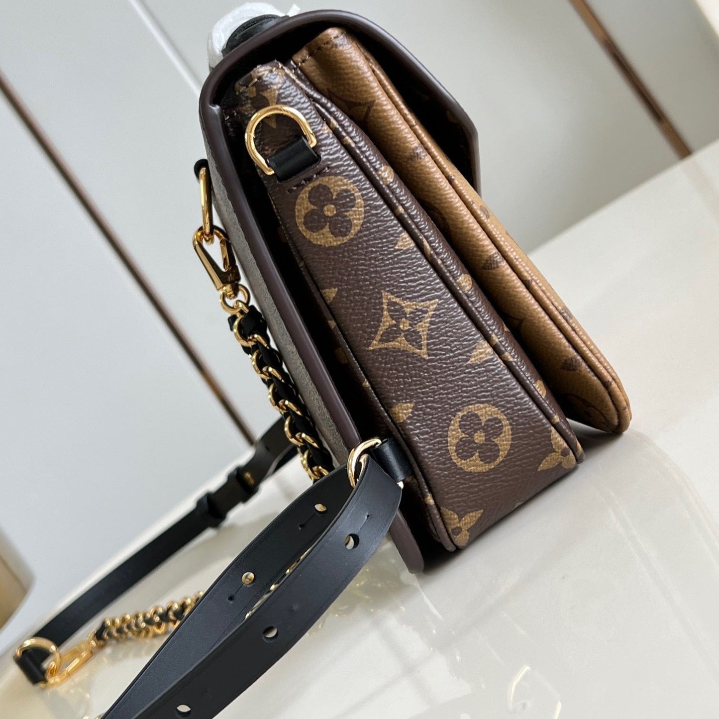 POCHETTE M¨¦TIS 20 IN BROWN MONOGRAM AND MONOGRAM REVERSE CANVAS GOLD BUCKLE