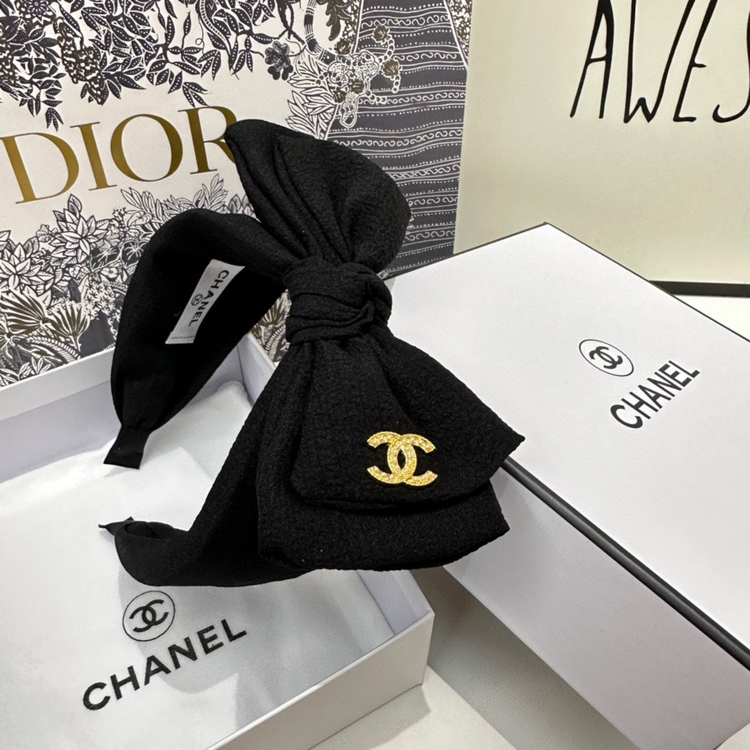 BLACK FABRIC HEADBAND WITH BOW 168569
