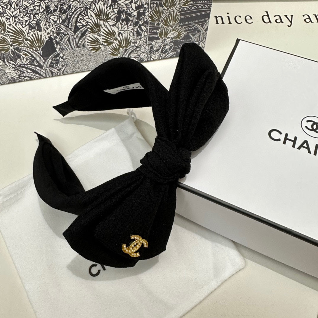 BLACK FABRIC HEADBAND WITH BOW 168569