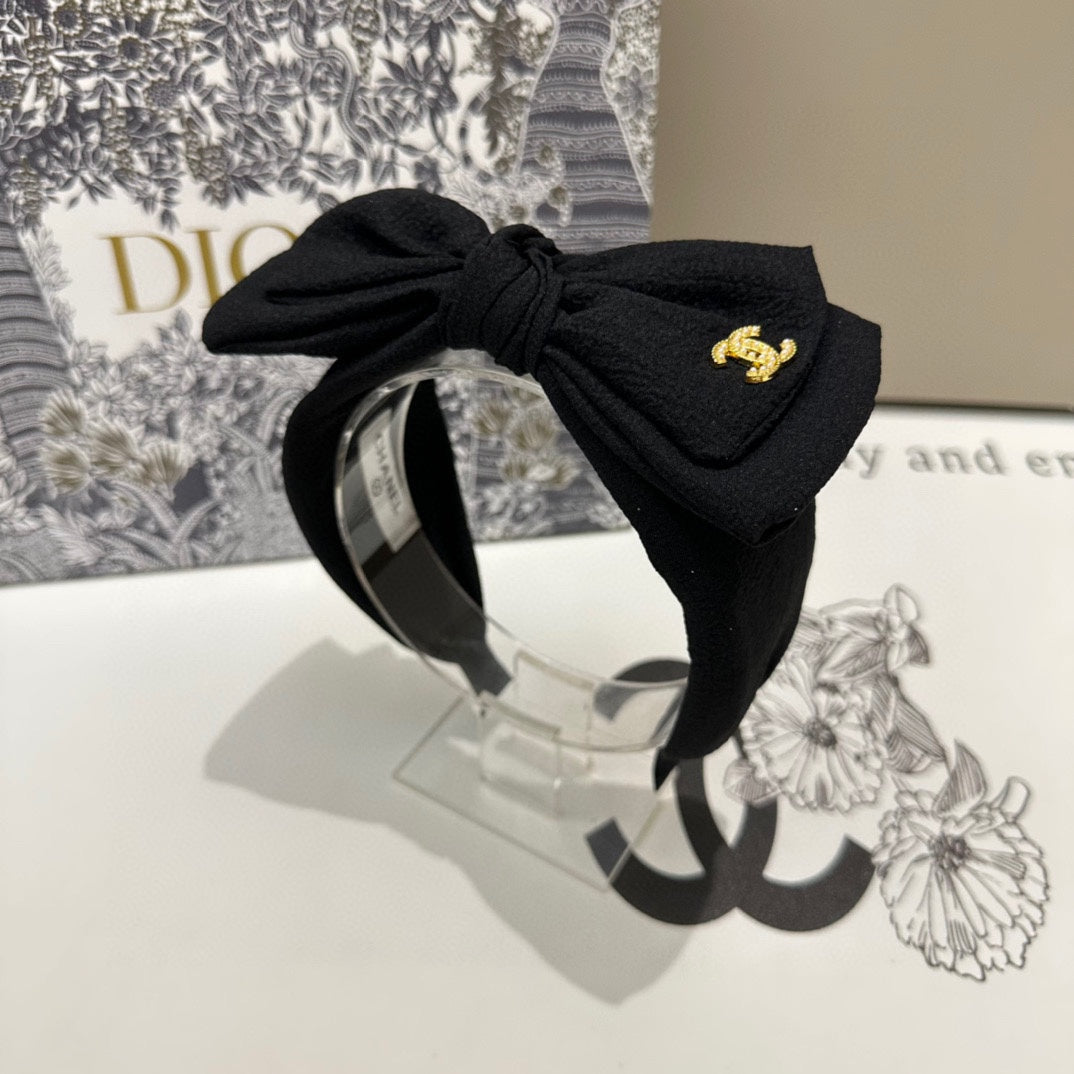 BLACK FABRIC HEADBAND WITH BOW 168569
