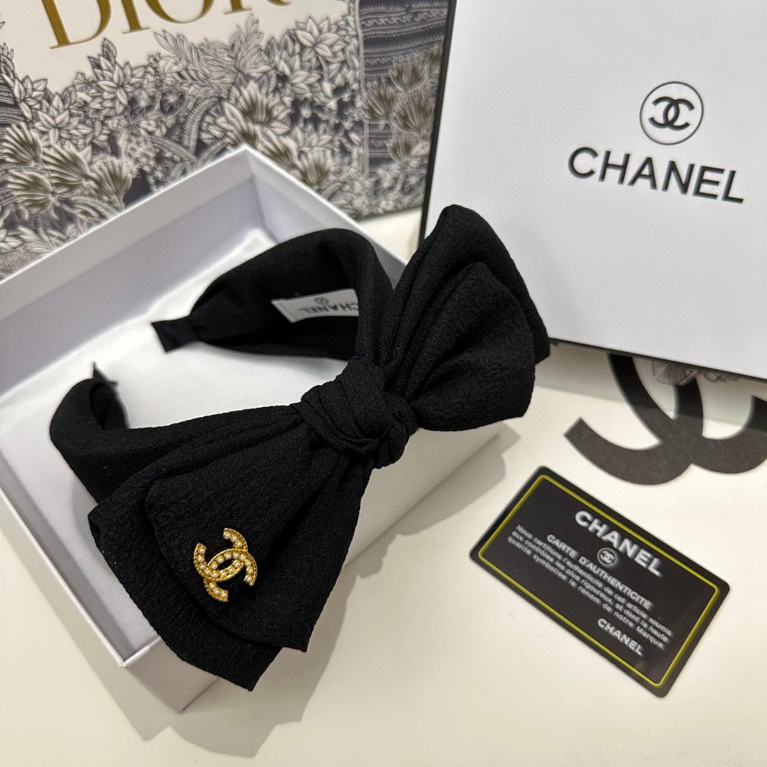 BLACK FABRIC HEADBAND WITH BOW 168569