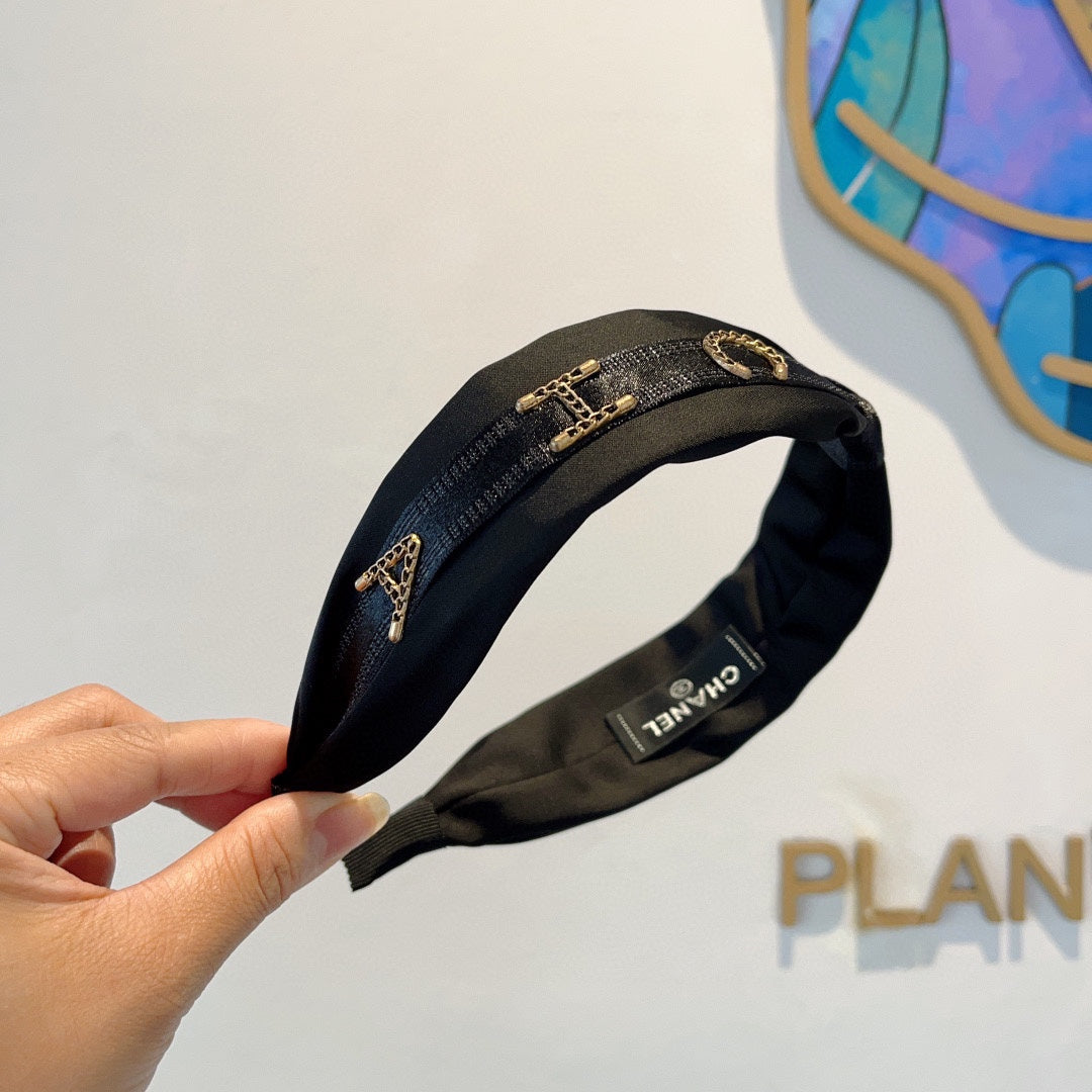 BLACK SILK HAIRBAND WITH GOLD LOGO 412441