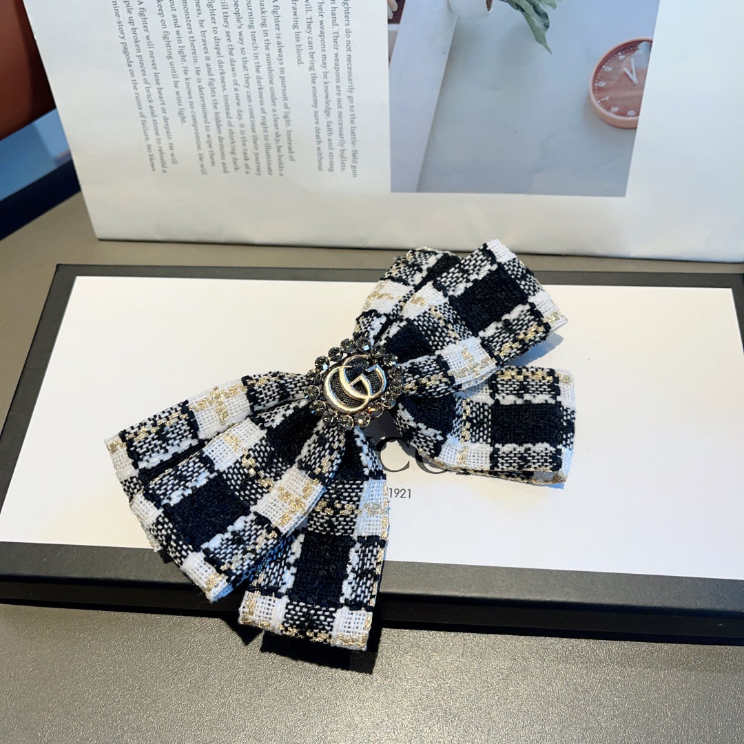 RETRO BOW HAIR CLIP IN BLACK MIX WHITE TWEED 432763