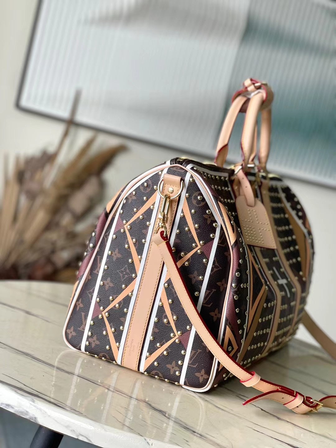 KEEPALL BANDOULI¨¨RE 50 IN PARFLECHE PATTERN MONOGRAM CANVAS