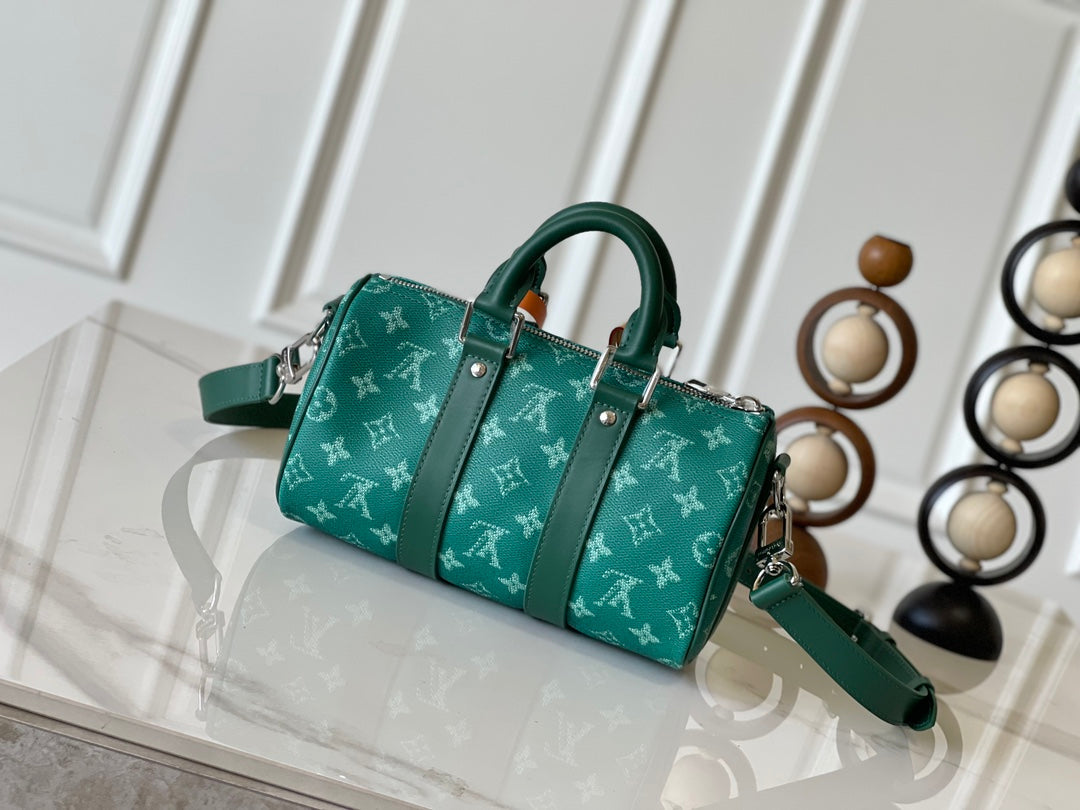 KEEPALL BANDOULI¨¨RE 25 IN GREEN MONOGRAM HERITAGE CANVAS