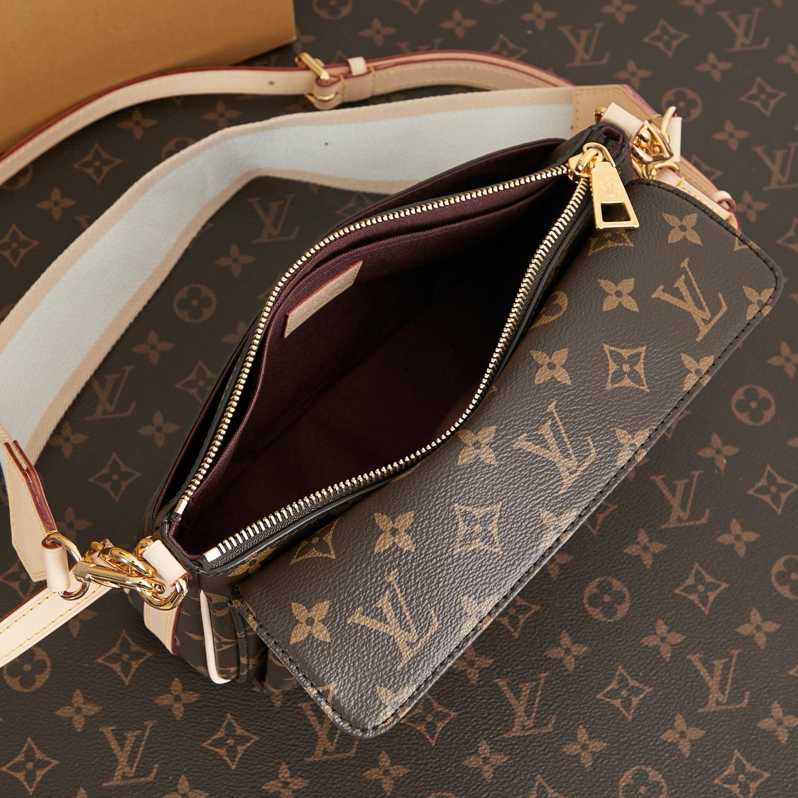 VIVACIT¨¦ 25 IN BROWN MONOGRAM CANVAS GOLD HARDWARE