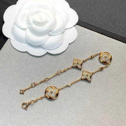 DIANA STAR AND SUN 4 MOTIFS GOLD DIAMONDS BRACELET