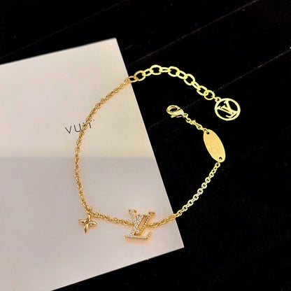 DIANA LOGO STAR MOTIF GOLD BRACELET