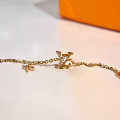 DIANA LOGO STAR MOTIF GOLD BRACELET
