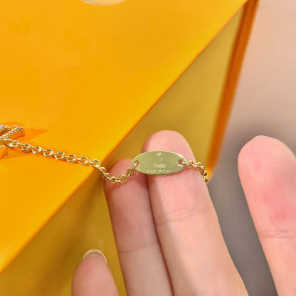 DIANA LOGO STAR MOTIF GOLD BRACELET