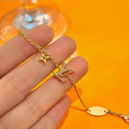 DIANA LOGO STAR MOTIF GOLD BRACELET