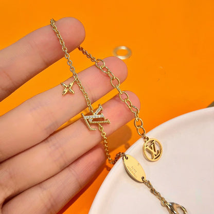 DIANA LOGO STAR MOTIF GOLD BRACELET