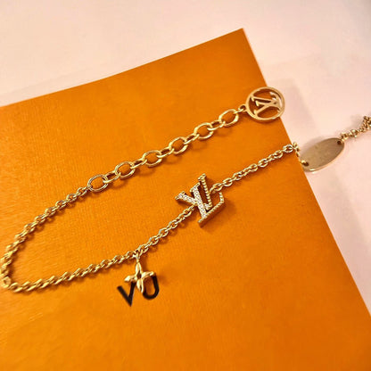 DIANA LOGO STAR MOTIF GOLD BRACELET