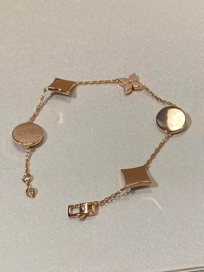 DIANA STAR AND SUN 5 MOTIF MOP PINK GOLD BRACELET