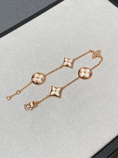 DIANA STAR AND SUN 5 MOTIF MOP PINK GOLD BRACELET