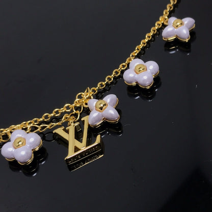 DIANA LOGO 6 MOTIF STAR AND SUN GOLD BRACELET