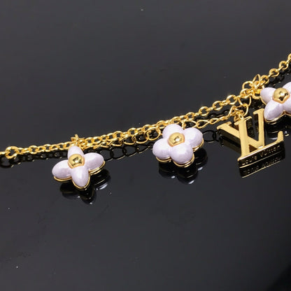 DIANA LOGO 6 MOTIF STAR AND SUN GOLD BRACELET