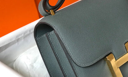 constance 24 bleu orange epsom leather gold hardware