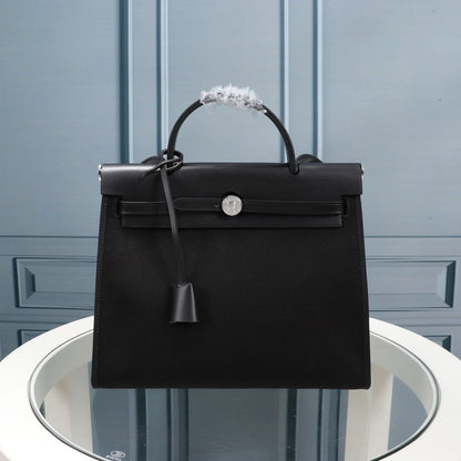 HM HERBAG ZIP 31 BLACK CANVAS