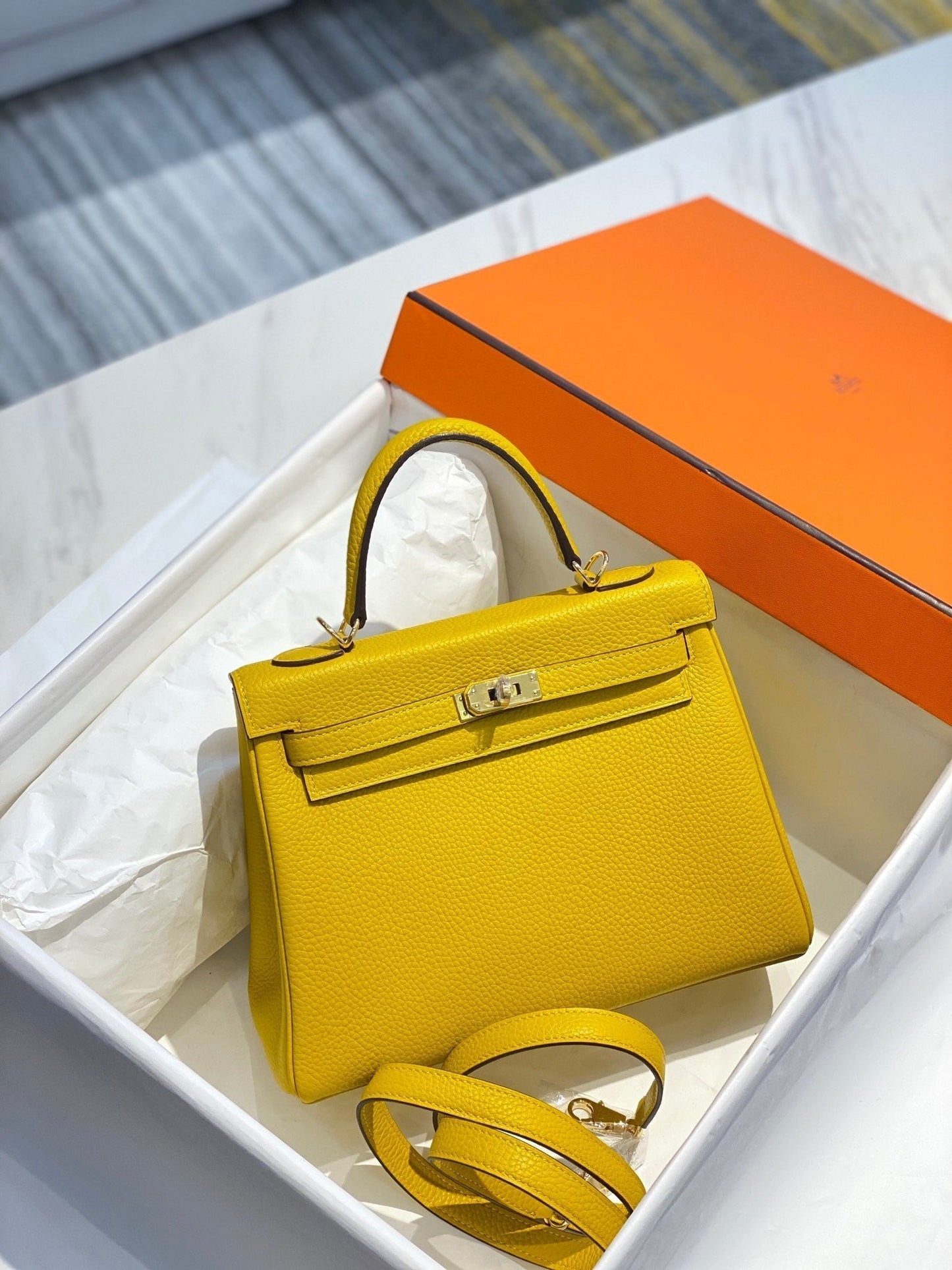 HM KELLY 25CM YELLOW TOGO GOLD HARDWARE