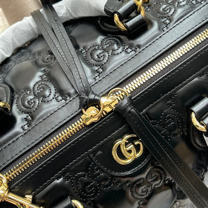 MATELASS¨¦ TOP HANDLE BAG 31 IN BLACK EMBOSSED CALFSKIN GOLD HARDWARE