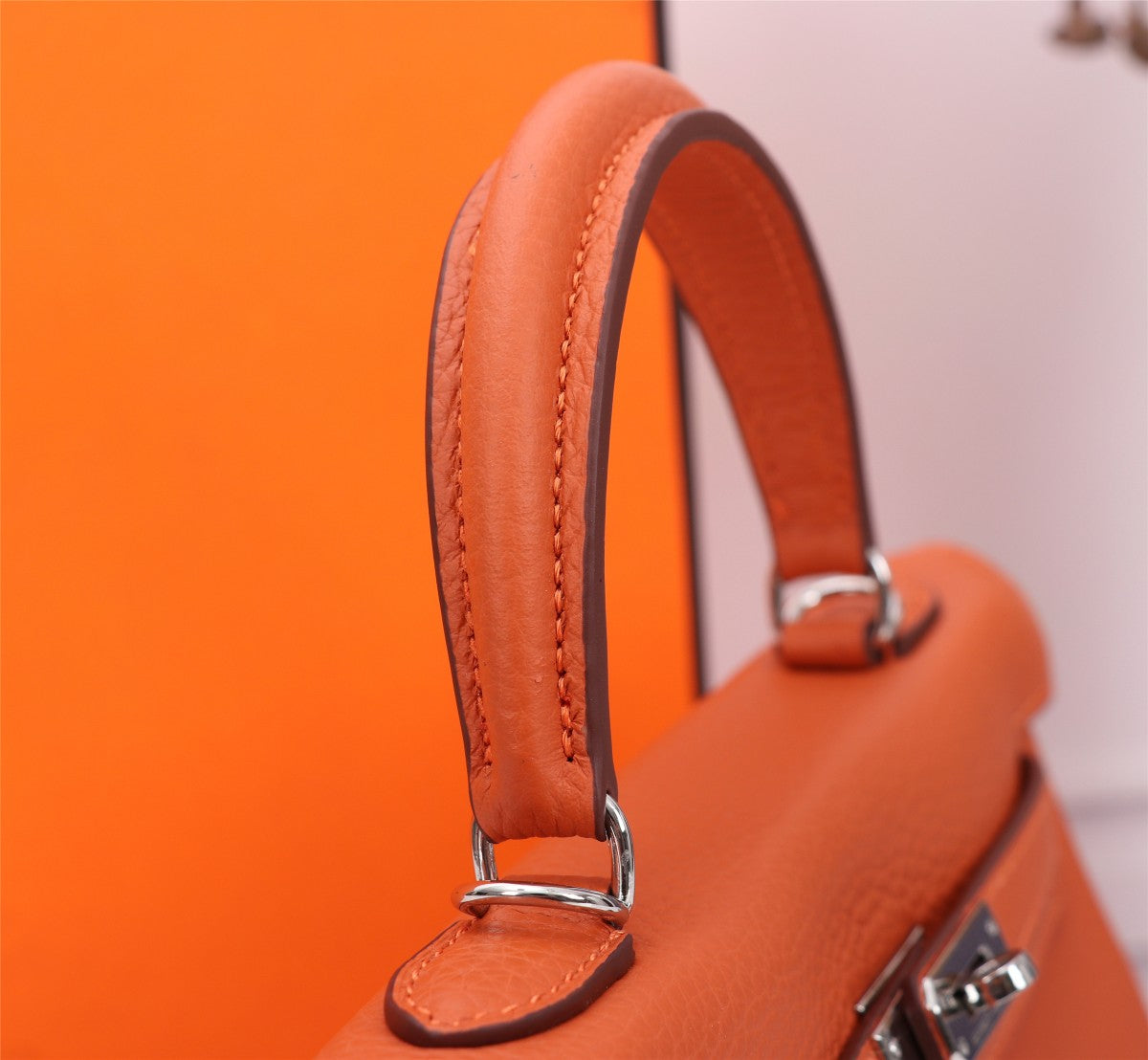 HM KELLY BAG 25 ORANGE TOGO SILVER HARDWARE
