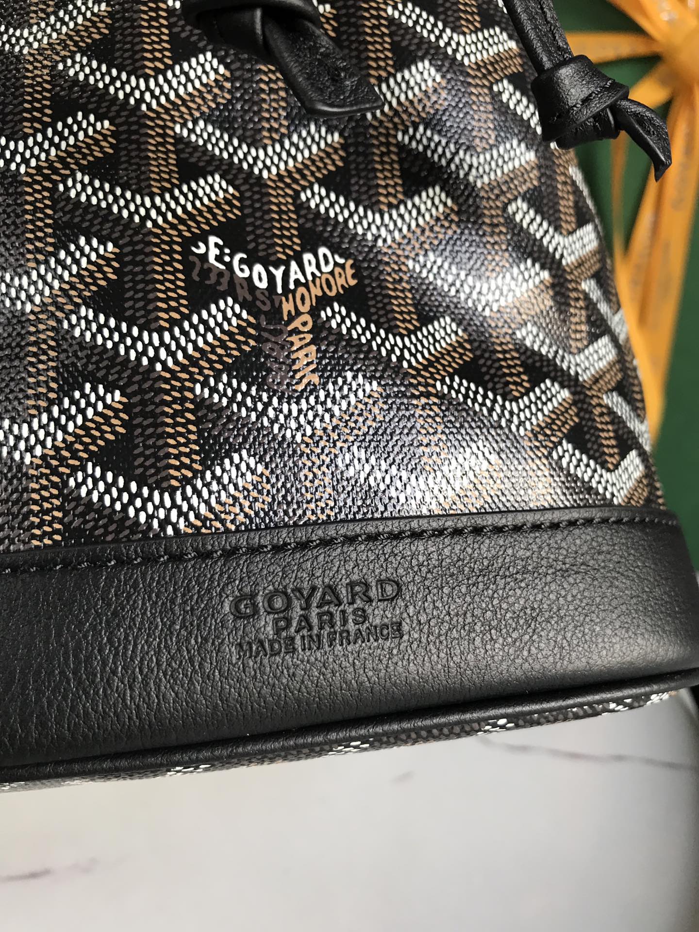 PETIT FLOT BUCKET BAG 22 IN BLACK GOYARDINE CANVAS AND LAMBSKIN TRIM