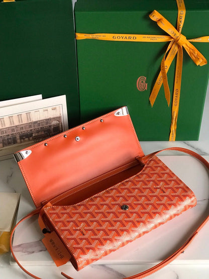 MONTE-CARLO PM CLUTCH 25 IN ORANGE GOYARDINE CANVAS