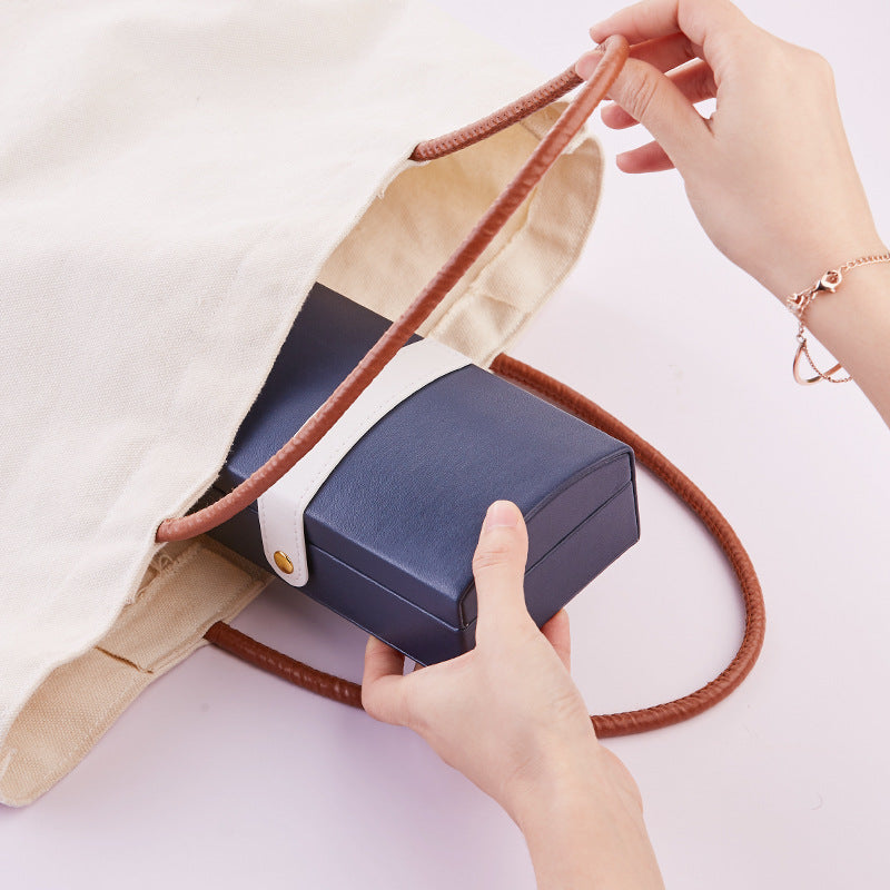 Superbe coffret à bijoux portable en cuir synthétique