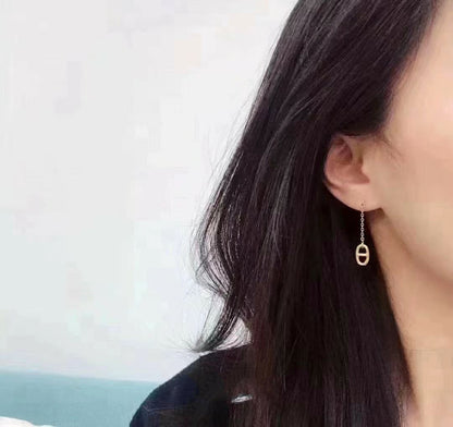BOUCLES D'OREILLES À POMPON DIANA CHAINE