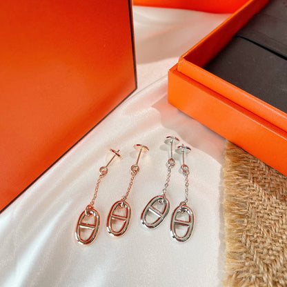 BOUCLES D'OREILLES À POMPON DIANA CHAINE
