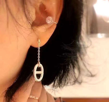BOUCLES D'OREILLES À POMPON DIANA CHAINE