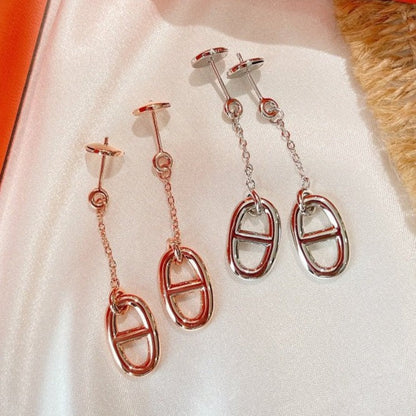 BOUCLES D'OREILLES À POMPON DIANA CHAINE
