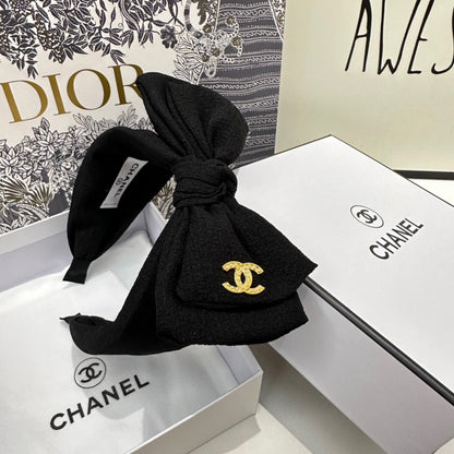 BLACK FABRIC HEADBAND WITH BOW 168569