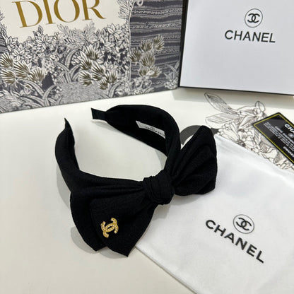 BLACK FABRIC HEADBAND WITH BOW 168569