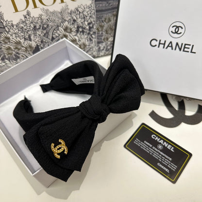 BLACK FABRIC HEADBAND WITH BOW 168569