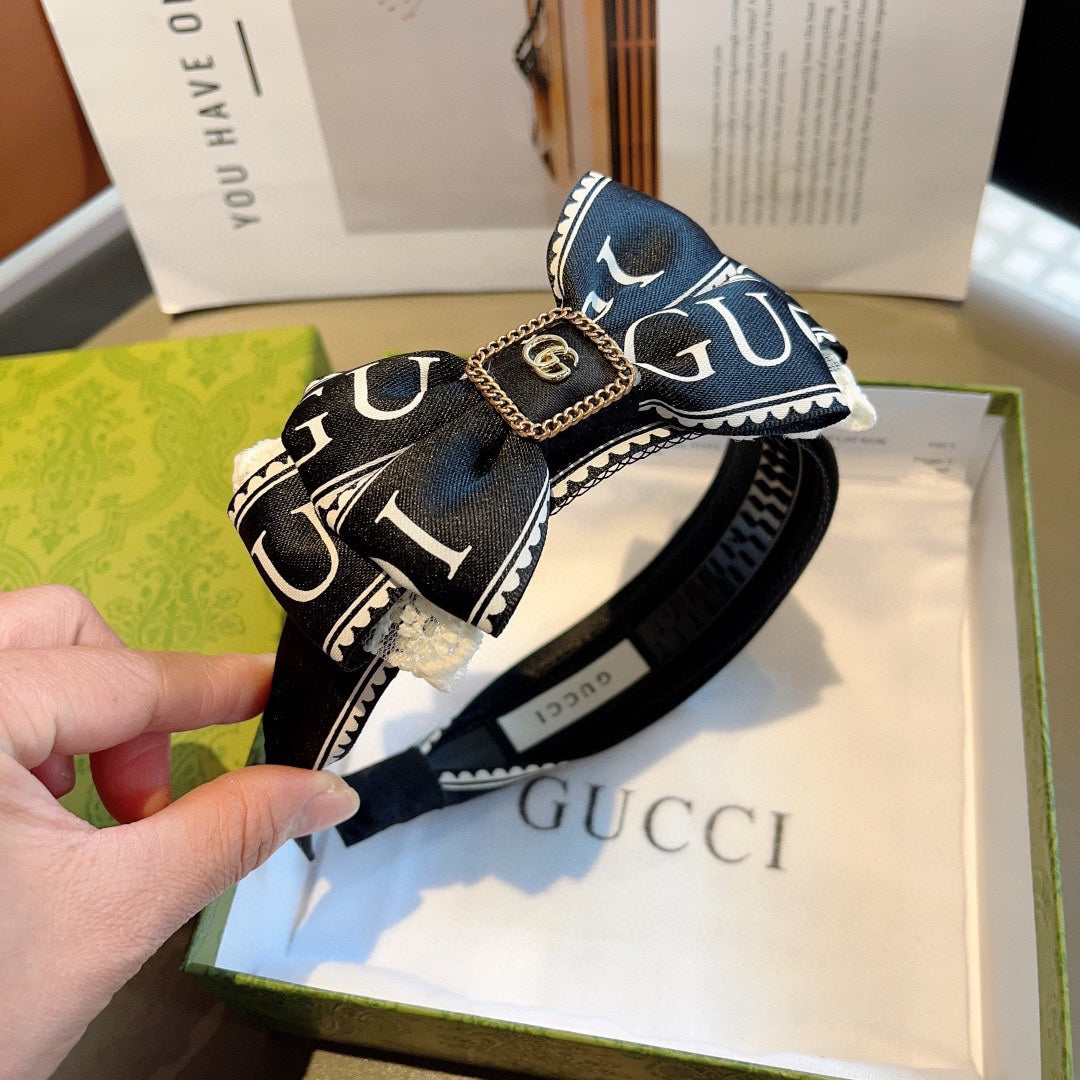 BOW HAIRBAND IN BLACK MIX WHITE RESIN AND FABRIC 432749