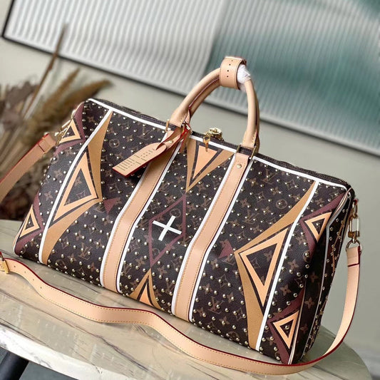 KEEPALL BANDOULI¨¨RE 50 IN PARFLECHE PATTERN MONOGRAM CANVAS